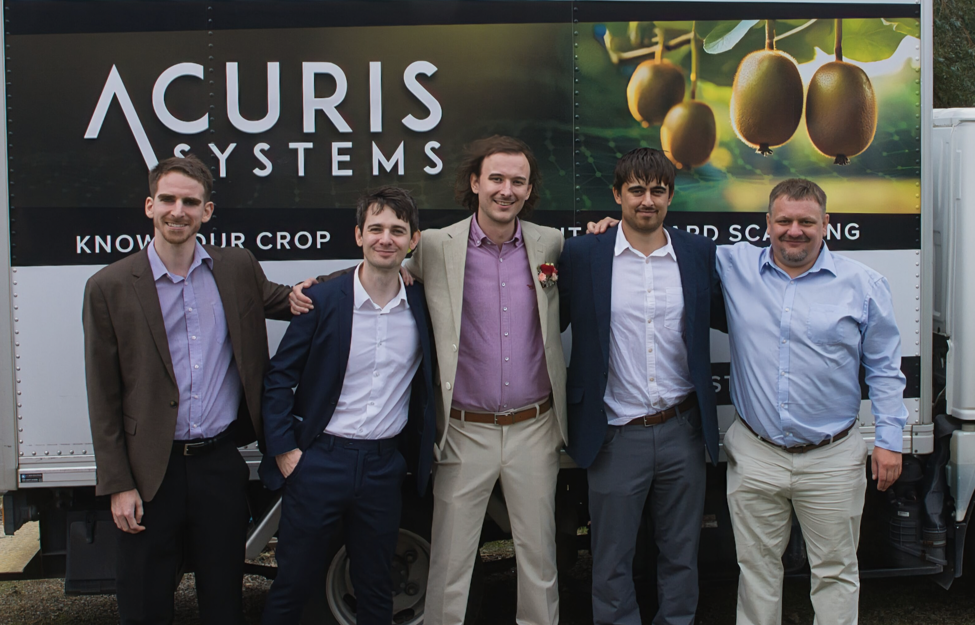 The Acuris team together in front of the company trailer. From left: Aaron, Patrick, Matthew, Zak and Egor.